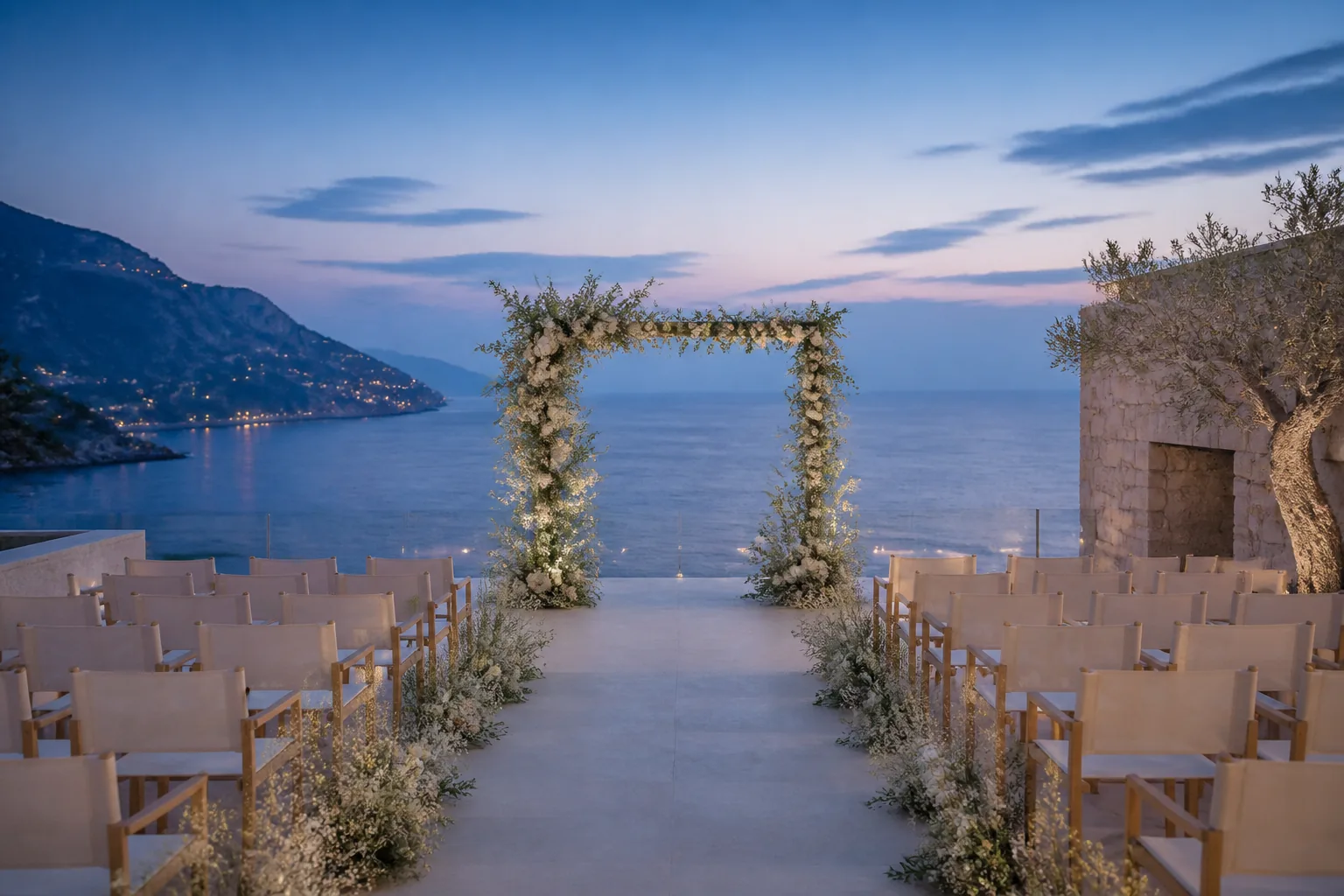 Open-air coastal ceremony terrace at blue hour
